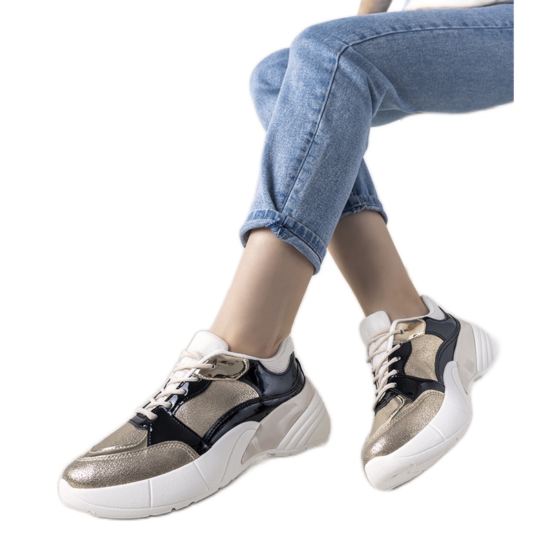 Złote sneakersy na wysokiej podeszwie Rude czarne
