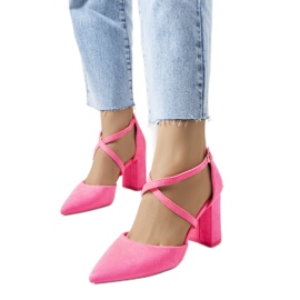 Różowe neonowe czółenka na słupku Hassing