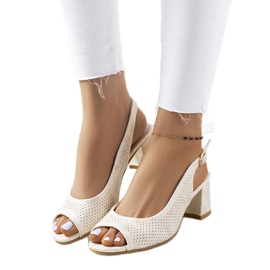 Złote ażurowe sandały na słupku Malone złoty