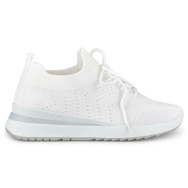 Białe buty sportowe na koturnie