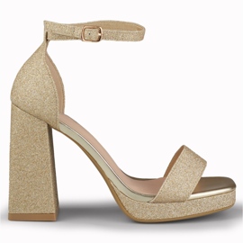 Złote błyszczące sandały na szerokim wysokim obcasie złoty