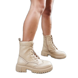 Beżowe trapery zdobione przeszyciami Nicla czarne