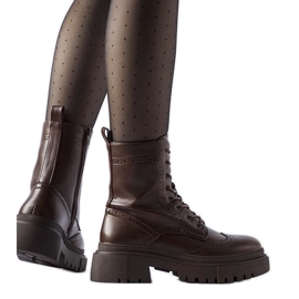 Brązowe trapery zdobione przeszyciami Nicla