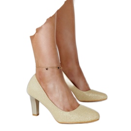 Złote błyszczące czółenka ze skórzaną wkładką Antibies złoty