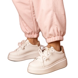 Biało-złote sneakersy sportowe na platformie białe