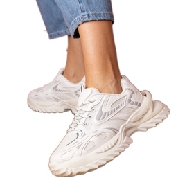 Białe sneakersy sportowe na stylowej podeszwie