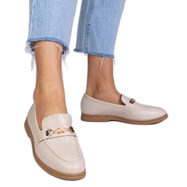 Beżowe mokasyny ze złotą ozdobą beżowy