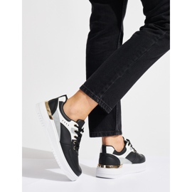 Czarne buty sportowe na platformie 3