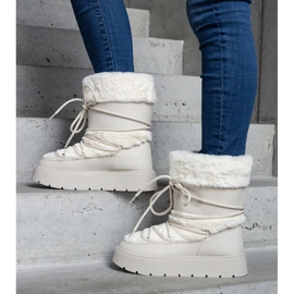 Jasnobeżowe ocieplane śniegowce damskie wsuwane zdobione futerkiem beżowy 1