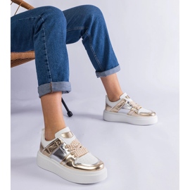 Złote sneakersy ze srebrnymi wstawkami złoty 1