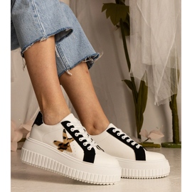 Biało-czarne sneakersy zdobione brokatem i gwiazdką białe 2