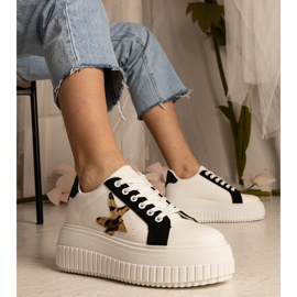 Biało-czarne sneakersy zdobione brokatem i gwiazdką białe 1