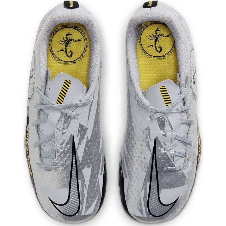 Buty piłkarskie Nike Phantom Gt Academy Scorpion FG/MG Junior DB7631 001 białe 1