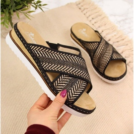 Klapki na koturnie Rieker W R459 czarne 1